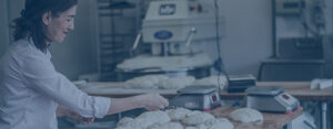 woman in bakery working